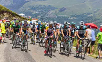 Watch: Fan sign upends Tour de France rider, others follow