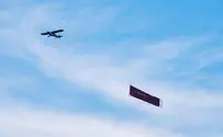 What was behind the 'Jew, I have a question' aerial banner?