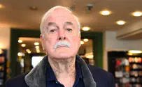 John Cleese cancels event over debate on Hitler impersonation.