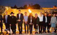 Hanukkah candles lit at Western Wall in memory of Eli Kay