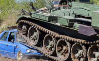 Ukrainian man tries to stop Russian armored column
