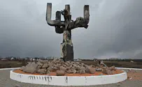 Sergey Bobok/ AFP via Getty Images Memorial to Jewish Holocaust victims damaged by Russian shelling