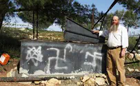 יום השואה: צלבי קרס בכרמי בת-עין