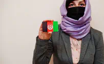 Watch: Afghani newsman wears 'half-burqa' in protest of Taliban