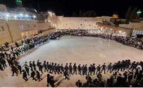 Singing together at the Western Wall at the end of Shavuot