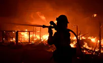 At least 21 dead in Gaza fire, Israel offers assistance