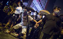 Watch: Police in China use water cannons, beat protesters