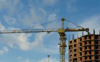 Two people missing after crane collapses due to storm