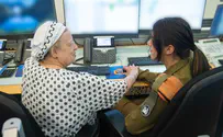 שורדת השואה ונכדתה הפעילו את צפירת הזכרון
