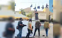 Hilltop Youth take boots left at protest display