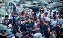 Dozens protest, police officer stabbed