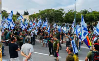 Anti-government protesters gather outside Smotrich's home