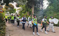 Rush to bury hundreds of massacre victims before Shabbat