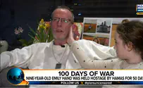 Freed 9-year-old comforts father during interview