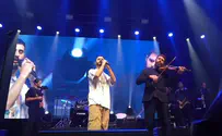 Violinist injured in Gaza performs with Eden Hason