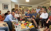 Courtesy of the family Injured soldier says 'Hagomel' blessing in home of fallen comrade
