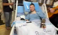 Seriously injured soldier participates in prayers