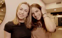 Iliza Shlesinger and Noa Tishby light Hanukkah candles