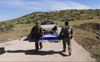 Chilling: Kaddish said next to Tzvi Feldman's coffin, when his body was brought to Israel