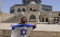 MK Tzvi Succot raises Israeli flag on Temple Mount
