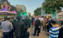 Torah dedication march pauses to show solidarity for hostages