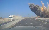 Missile falls meters from moving vehicle