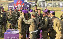 Father of fallen soldier presents berets to haredi soldiers