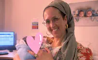 Hostage's parents celebrate birth of grandson