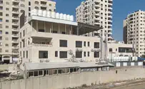 Illegal building becomes part of security barrier