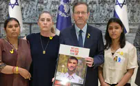 Amos Ben-Gershom/GPO President Herzog meets family of abducted Nepalese student