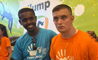 Wounded soldier volunteers with special-needs children