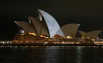 Reuters Following murderous attack: Iconic Sydney Opera House lit up with a menorah