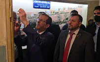 Arutz Sheva Herzog affixes mezuzah to new visitors center honoring rabbi