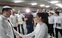 Wedding disrupted by sirens continues in bomb shelter