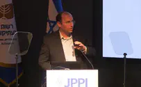 צילום: המכון למדיניות העם היהודי עימות בכנס: המפגינים קטעו את רוטמן