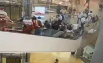 Watch: Police chase suspect through crowded mall