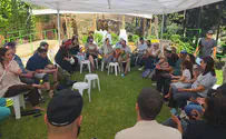 Tearful farewell at grave of fallen soldier
