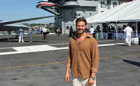 Courtesy Captivity survivor performs aboard US aircraft carrier