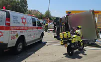 Truck plows into vehicles after overturning at gas station