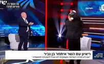 Ben Gvir and Smotrich embrace on stage