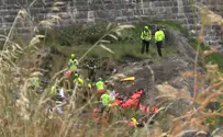 Two killed after aircraft hits cables and erupts in flames