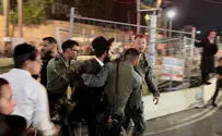 Rioters torch bins, tear down light rail barriers