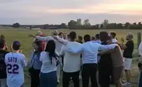 Kesher Yehudi Nova survivors and freed hostages dance at Auschwitz