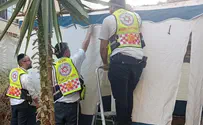 Magen David Adom MDA team treats woman, then builds her sukkah