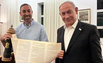Courtesy Rabbi presents Netanyahu with biblical-style scroll on Iran war