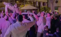 Kesher Yehudi Nova massacre survivors dance with Torah scrolls