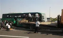 One Dead as Bus and Truck Collide, 31 to Hospital