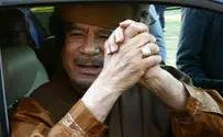 US: "Muammar Qadaffi Must Go!"
