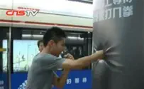 Screen Capture Chinese Commuters Beat the Ads