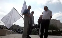 Demonstrators Carry White Flags, Protest Surrender to Terror